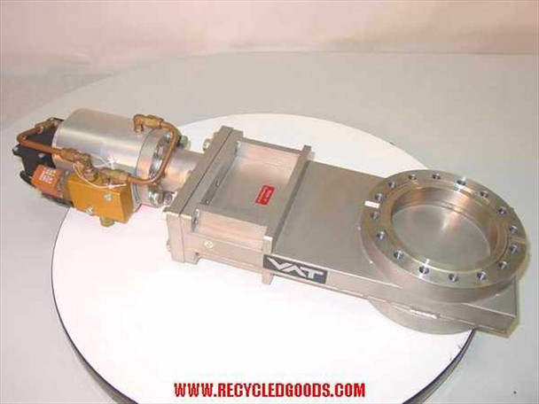 VAT Series 108 UHV gate valve — rear-left view showing opposite side of stainless steel body, pneumatic actuator, and gold-colored solenoid valve block with electrical connector