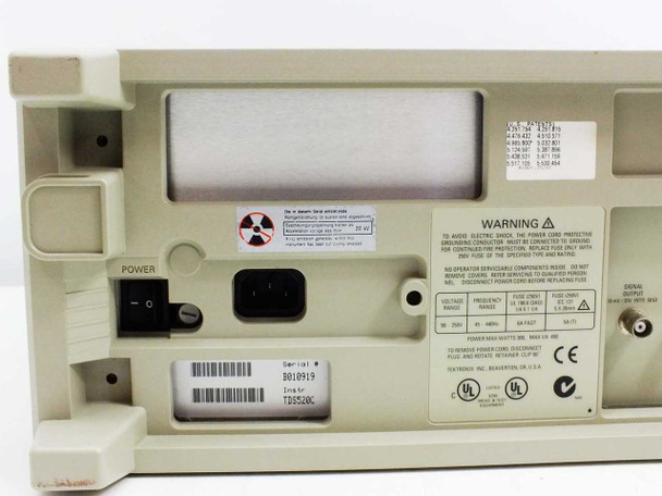 Tektronix TDS520C rear panel close-up showing power switch, IEC power inlet, serial number label, and fuse rating plate