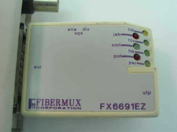 Fibermux FX6691EZ AUI-to-UTP transceiver close-up showing LED indicators: col, rcv, lnk, pwr, xmt, pol, jab, ena, dis, sqe