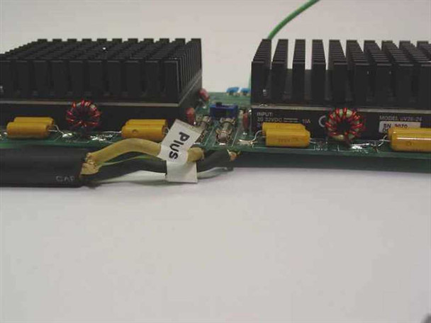 Center connector area between two uV28-24 converter modules showing input labeling and inter-board wiring with 'Plus' label tag
