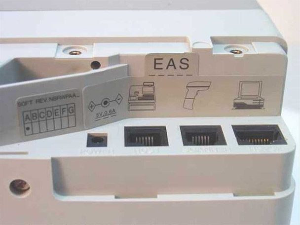 Symbol LS-5700-1000GN bottom panel showing EAS port, three RJ-style connector ports (Power, EAS, Scanner/Host), soft revision label, and 5V 0.6A power rating sticker