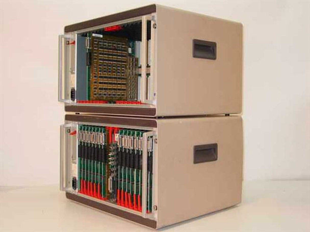 Philips VWI161/10 Vidiwall Processor — angled side view of both chassis stacked, showing installed expansion cards including large green PCBs with components, and carry handles on each chassis