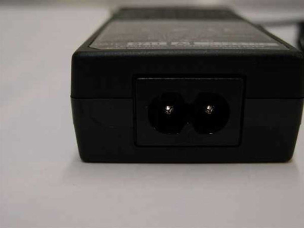 Toshiba PA2500U AC adapter end view showing figure-8 IEC C7 two-pin AC inlet connector