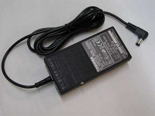 Toshiba PA2500U AC adapter top view showing Toshiba branding, right-angle barrel plug output cable, and figure-8 AC inlet end