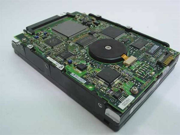Compaq 127889-001 Fujitsu MAE3091LC hard drive PCB underside showing controller board and circuitry