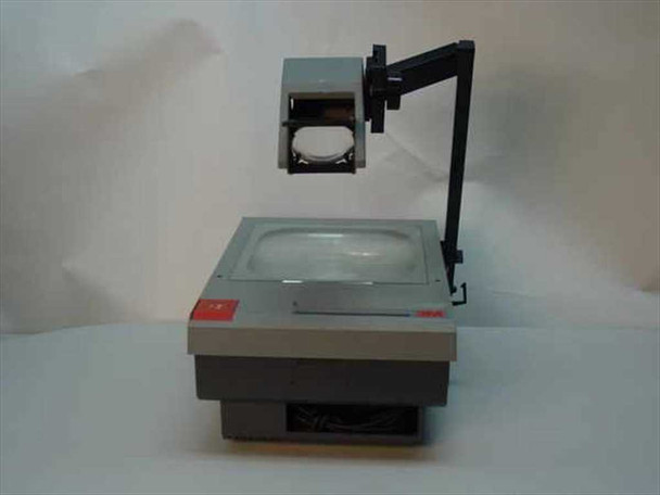 3M 905 Overhead Projector Model 900 AJA — front three-quarter view with projection head raised on arm, fresnel lens stage visible