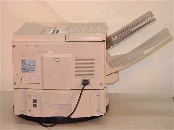 Canon Laser Class 9000L — rear view showing power cord, ventilation grilles, and paper output tray