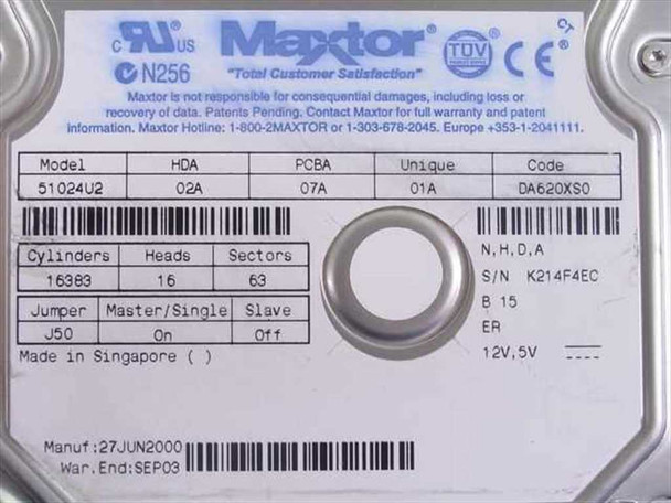 Maxtor 51024U2 close-up of drive label showing model 51024U2, cylinders/heads/sectors, jumper settings, manufacture date 27JUN2000, serial number, and Made in Singapore notation
