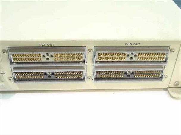 Network Systems FL2000-HP/HB rear panel showing four large parallel edge connectors labeled TAG OUT and BUS OUT plus partial SPI connector