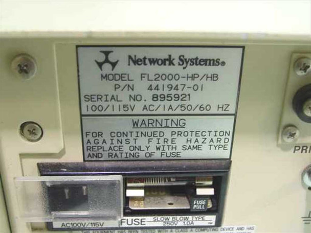 Network Systems FL2000-HP/HB rating plate close-up showing Model FL2000-HP/HB, P/N 441947-01, Serial No. 895921, 100/115V AC/1A/50/60Hz, slow-blow fuse, and FCC warning text