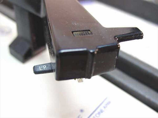 Califone 1010AV tonearm cartridge close-up showing two-position LP sapphire stylus