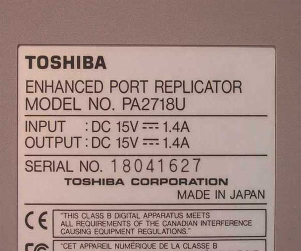 Toshiba PA2718U Enhanced Port Replicator – bottom label showing model number, DC 15V 1.4A input/output, Made in Japan