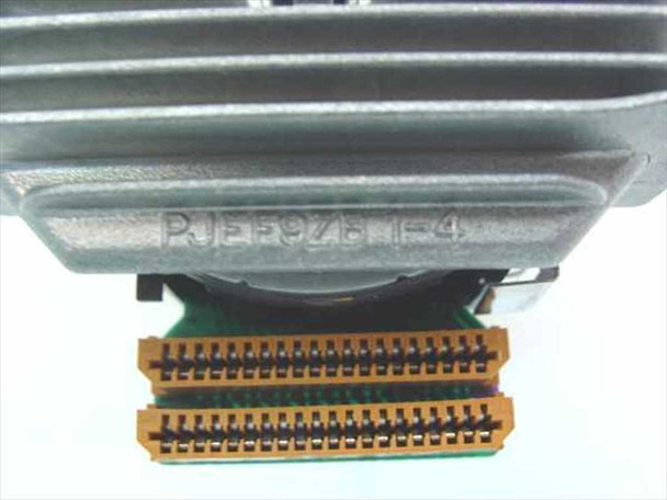 Panasonic KX-P2123 printhead — close-up of underside showing embossed part marking and dual-row gold flex cable connectors