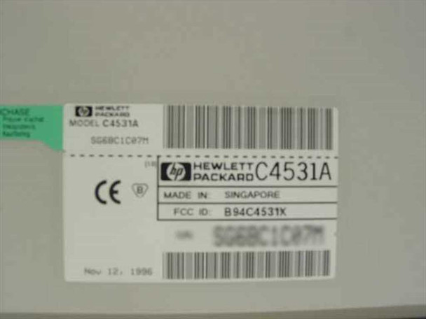 HP DeskJet 820Cxi bottom label showing Model C4531A, Made in Singapore, FCC ID B94C4531X, dated Nov 12 1996