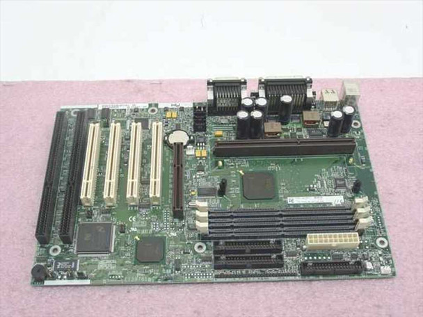 Intel 683503-305 AL440LX Slot 1 ATX motherboard — top-right angle showing AGP slot, DIMM slots, dual IDE connectors, capacitors, and chipset area