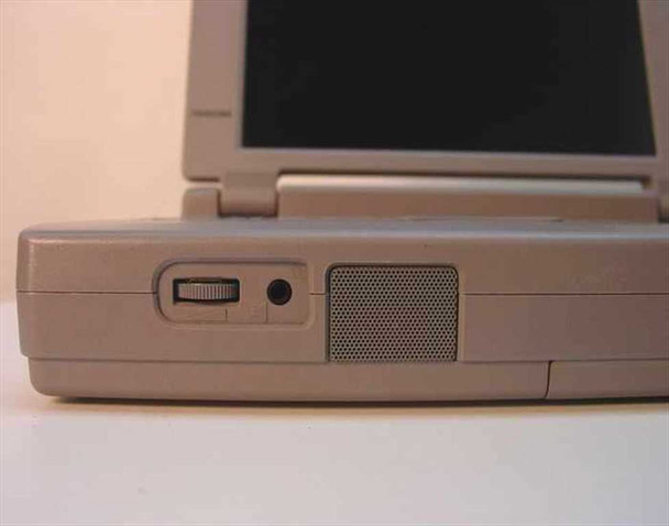 Toshiba Satellite Pro 435CDS left side — slider switch, headphone jack, and built-in speaker grille