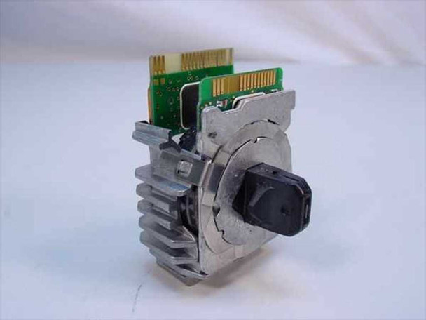 Okidata 50099501 dot matrix printhead showing aluminum heat sink body, flex PCB connector on top, and ink guide nozzle tip — angled front view