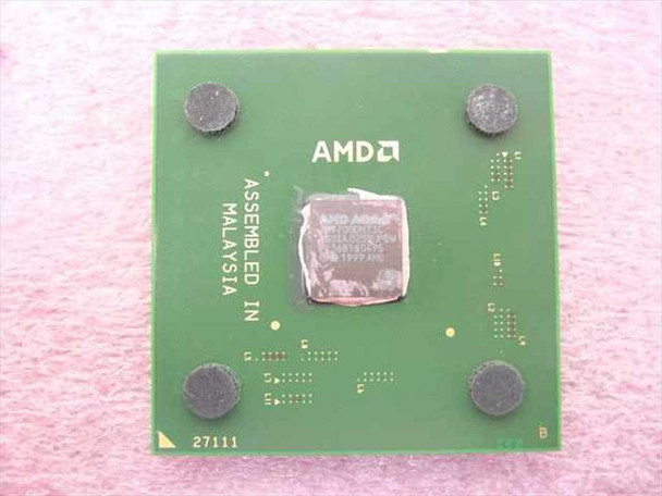 AMD Athlon XP 1700+ AX1700DMT3C Socket A processor – top view showing AMD logo and integrated heat spreader, assembled in Malaysia