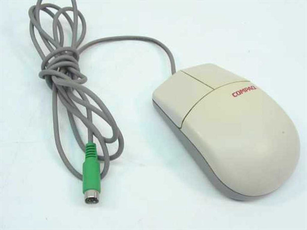 Compaq MUS9J PS/2 two-button mouse with green mini-DIN 6-pin connector and grey cable — top/side view