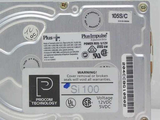 Quantum 105S/C drive label close-up showing Plus Impulse branding, 5/12V 6W power requirements, and Procom Technology Si100 markings