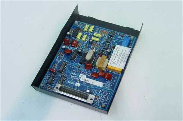 DMP Model 984-D Communication Module – interior PCB view showing blue circuit board with components, terminal blocks, and DB25 connector