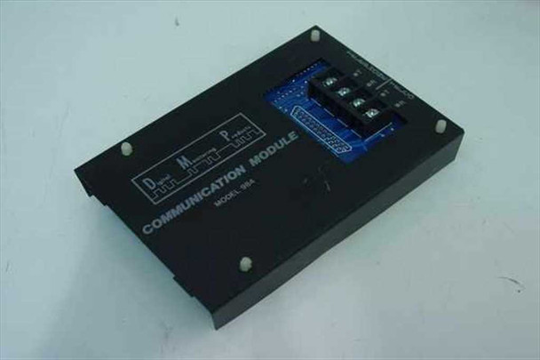 Digital Monitoring Products DMP Model 984 Communication Module – top view showing black enclosure and DMP logo plate with blue PCB visible