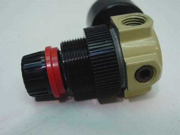 Dixon R07-200R mini regulator body showing 1/4 NPT port, adjustment knob, and gauge port — side view