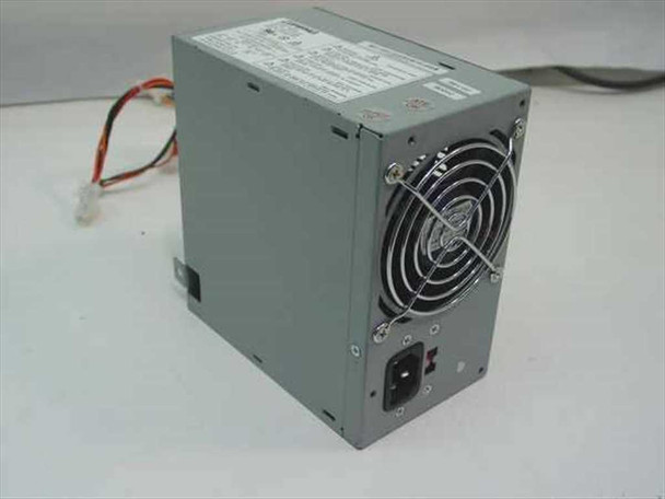 Compaq 201828-001 ATX power supply rear view showing IEC inlet, power switch, and cooling fan