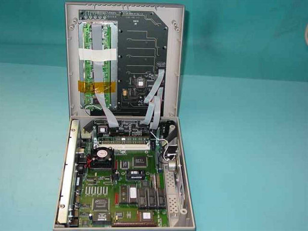 Intermec MaxiLAN DX200S opened interior showing main PCB, 30-pin SIMM slots, solid-state disk, ribbon cables, and LCD panel in lid