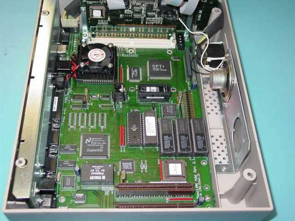 Intermec MaxiLAN DX200S main PCB close-up showing OPTi chipset, National Semiconductor SuperIO, AMD processor, 30-pin SIMM memory modules, CPU fan, and board labeled MaxiLAN Rev 2.2