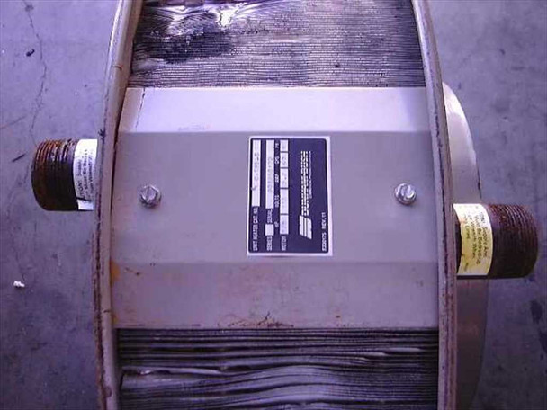 Dunham-Bush C-525-G unit heater – side view of fin coil with Dunham-Bush rating plate and two 1.5-inch threaded water inlet/outlet pipe connections visible