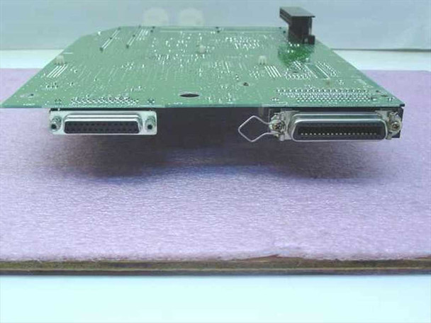 Lexmark 69G3199 RIP board edge-on view showing dual DB25-style parallel interface connectors on the rear bracket