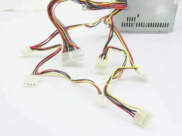 SPI FSP235-61GT ATX power supply – close-up of cable harness showing multiple Molex 4-pin drive connectors and Berg floppy connector
