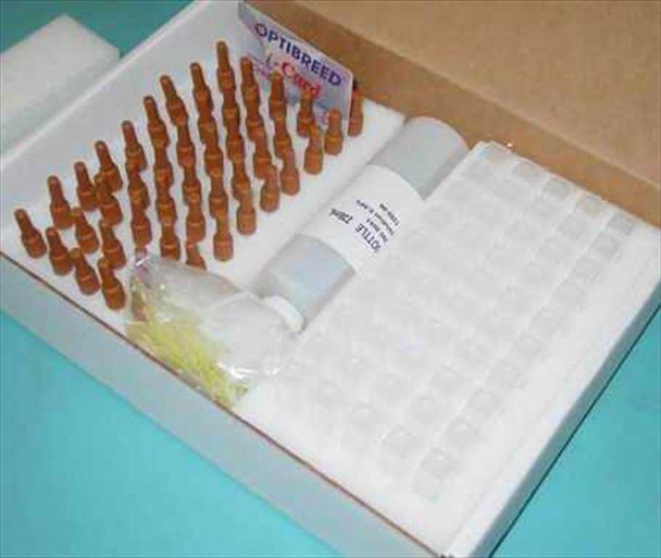 Open Optibreed test kit box showing sample vials in foam tray, reagent bottles, and Optibreed i-Card label