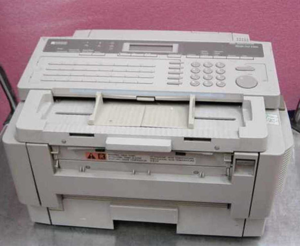 Ricoh 3500L plain paper laser fax machine H511-20 — front three-quarter view showing document feeder, control panel with LCD display and keypad, and paper output tray