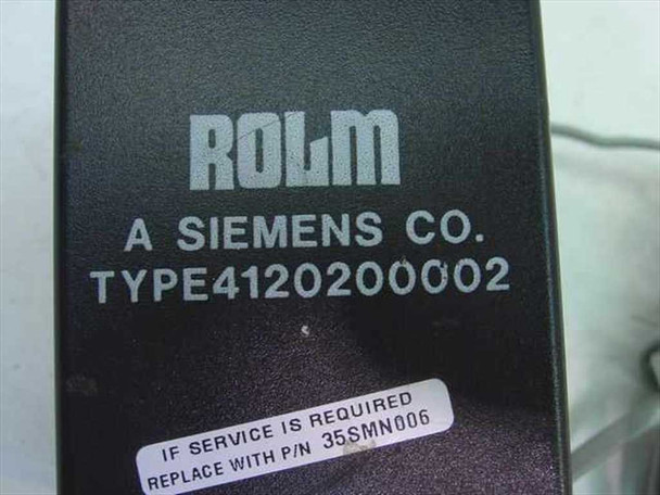 Close-up of ROLM A Siemens Co. TYPE4120200002 label with service replacement part number 35SMN006 sticker