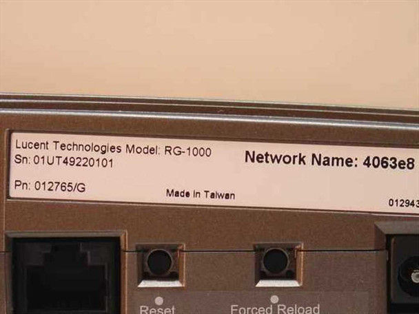 Lucent Technologies RG-1000 label showing model number, serial number SN 01UT49220101, part number 012765/G, and Made in Taiwan marking