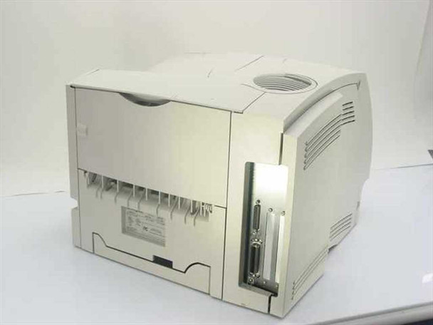Lexmark Optra S 1650 rear and right-side view showing parallel port interface card, ventilation grill, and paper output area