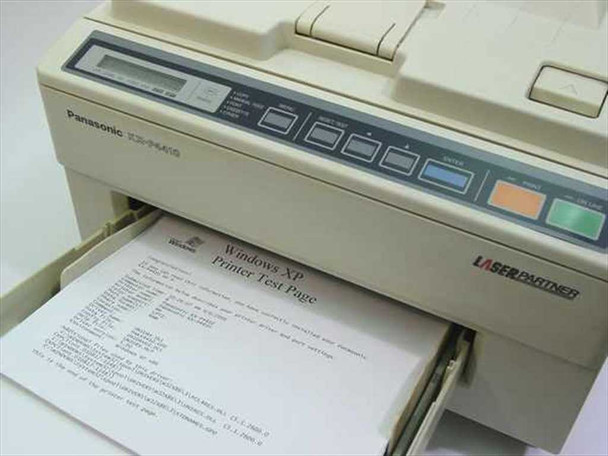 Panasonic KX-P4410 laser printer front panel close-up showing control buttons, status indicators, and a Windows XP Printer Test Page printing from the output tray