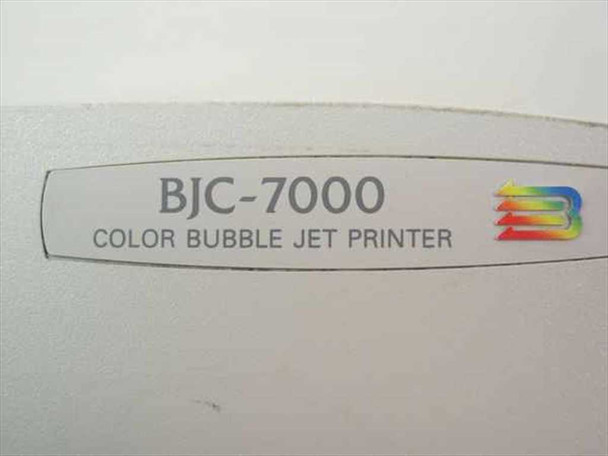 Canon BJC-7000 model name plate closeup — 'BJC-7000 Color Bubble Jet Printer' with Canon logo