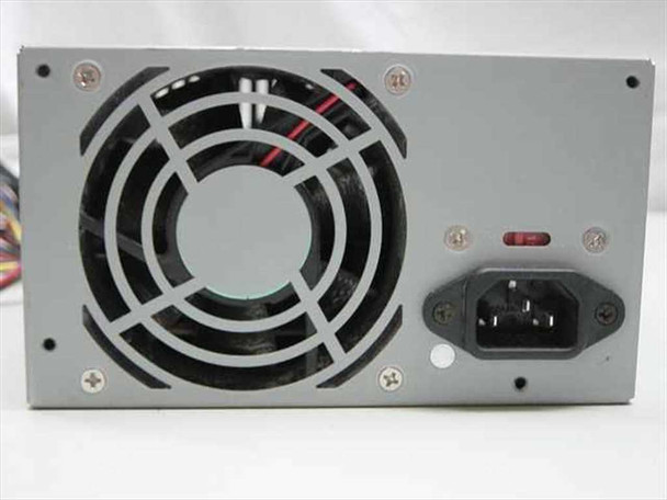 Dell HP-233SNF ATX power supply — rear panel showing 80mm cooling fan, IEC C14 AC inlet, and red voltage selector switch