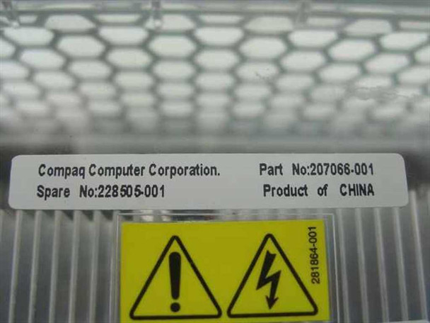 Compaq 207066-001 label showing Part No. 207066-001, Spare No. 228505-001, and Product of China — Compaq Computer Corporation