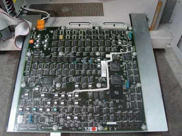 CalComp 68436 second large controller PCB laid flat on tray — dense IC population with large VLSI chips and edge connectors visible