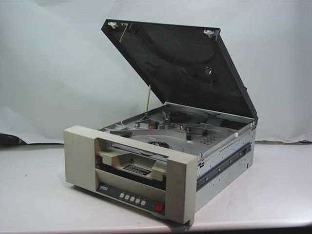Digital TS05-AA tape drive – top cover raised showing internal reel transport mechanism, tape path, capstan, and guides
