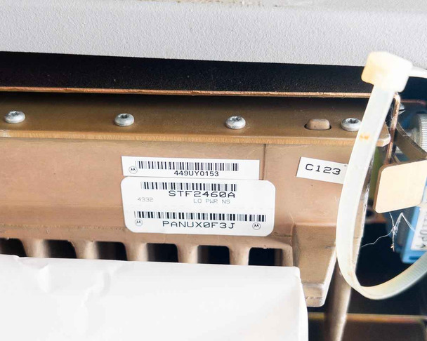 Label close-up on Motorola Microcite internal chassis showing STF2460A card part number label, barcode 449UY0153, and PANUX0F3J identifier