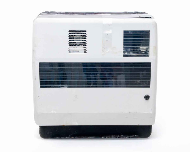 Motorola Microcite C25HDM01H7AF base station cabinet front/top view showing white enclosure with ventilation grilles and wear on lower panels