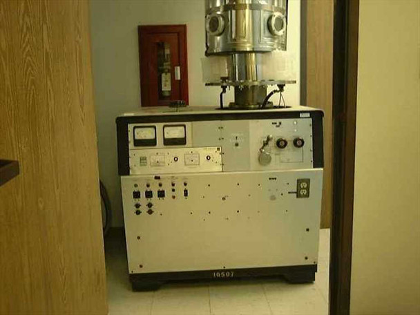 CHA Industries CHA-600 full system view from doorway — control console and stainless bell jar column, serial number 10507 visible on lower cabinet front