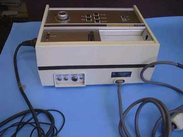 Burdick EK-8 Electrocardiograph rear and right-side view showing power cord, input connectors on rear panel, and Burdick label