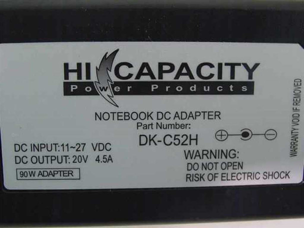 Hi Capacity DK-C52H label closeup showing Part Number, DC Input 11-27V, DC Output 20V 4.5A, 90W Adapter rating
