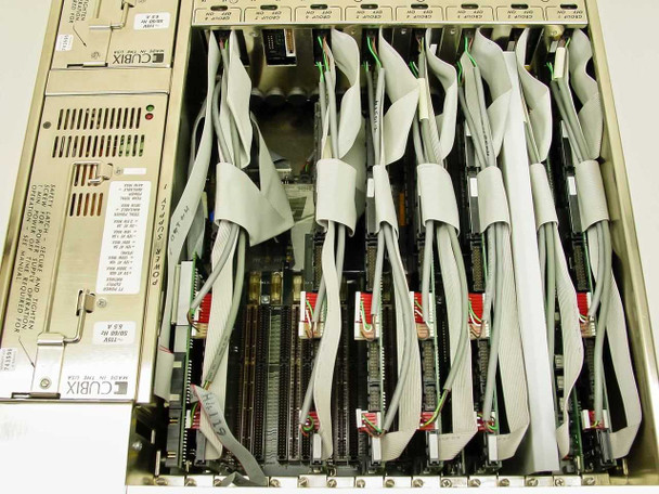 Interior view of Cubix FT Subsystem chassis showing multiple ISA CPU cards with ribbon cables installed across backplane
